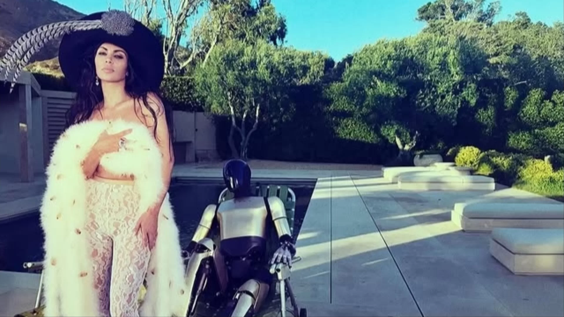 Kim Kardashian Laid Up With Her Tesla Robot